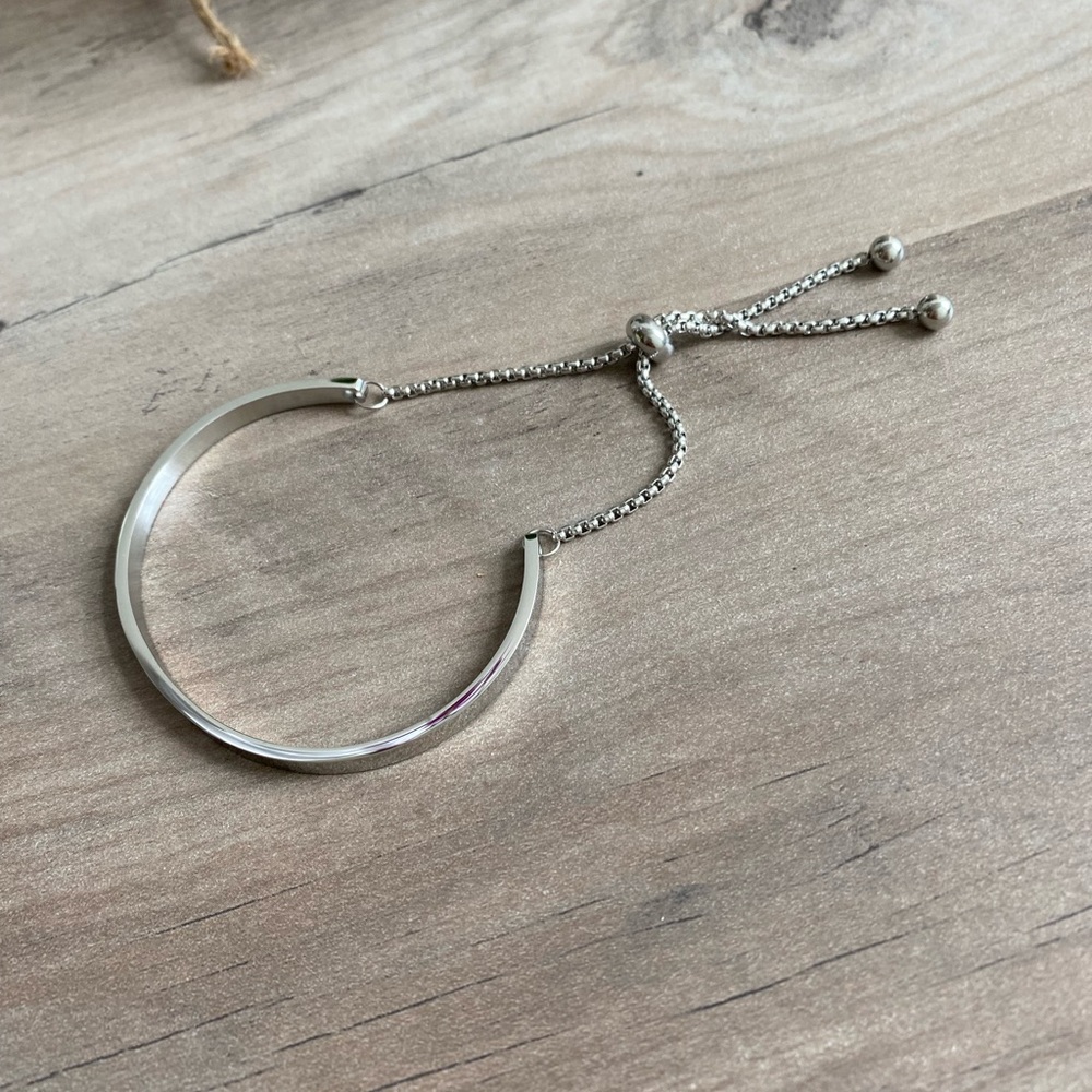 White Rhodium over Stainless Steel Curved Bar Slider Bracelet